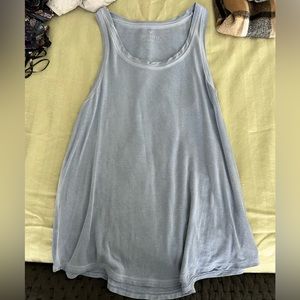 Medium, soft and sexy line at American Eagle, blue tank